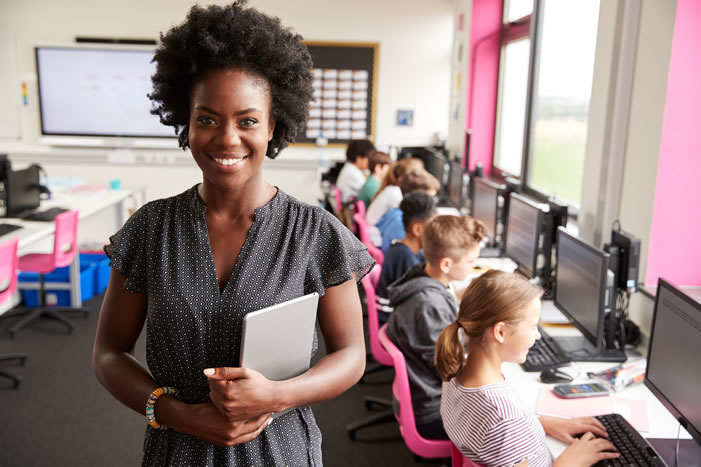 Teacher with students in classroom