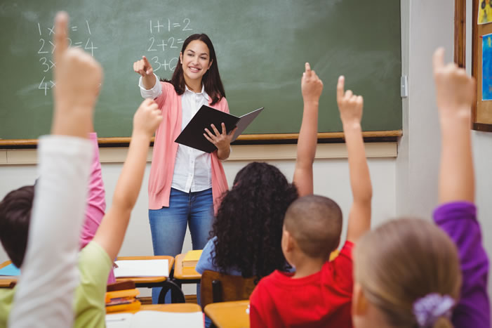 Teacher with students in classroom