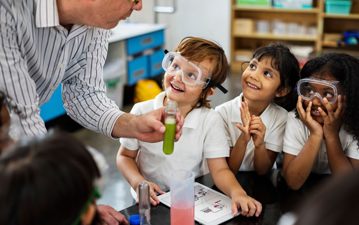 Teacher with students in classroom